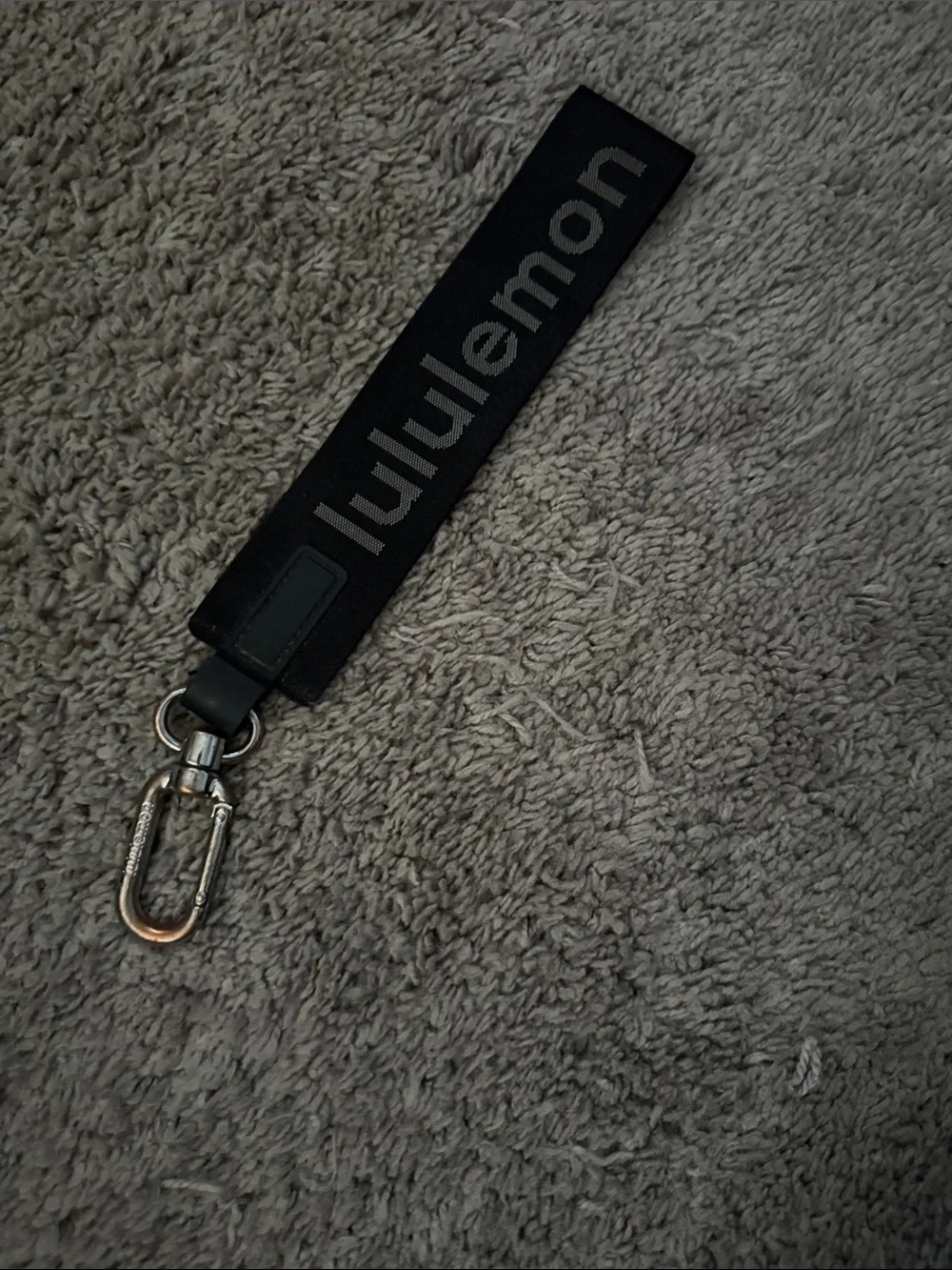 lululemon black branded key strap with silver hardware